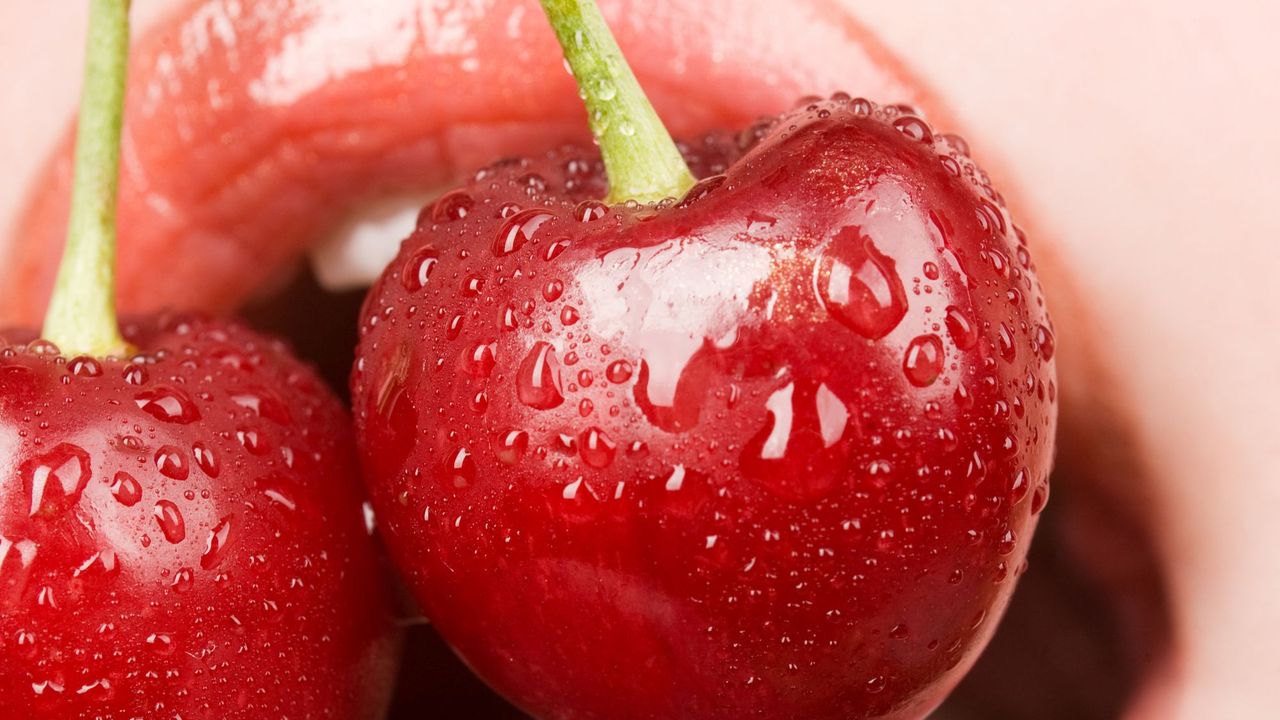 Sex positions for sexual issues: A woman licking a cherry