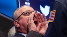 NEW YORK, NY - NOVEMBER 07:A trader on the floor of the New York Stock Exchange (NYSE) works as Twitter's initial price offering (IPO) is finalized on November 7, 2013 in New York City. Twitt