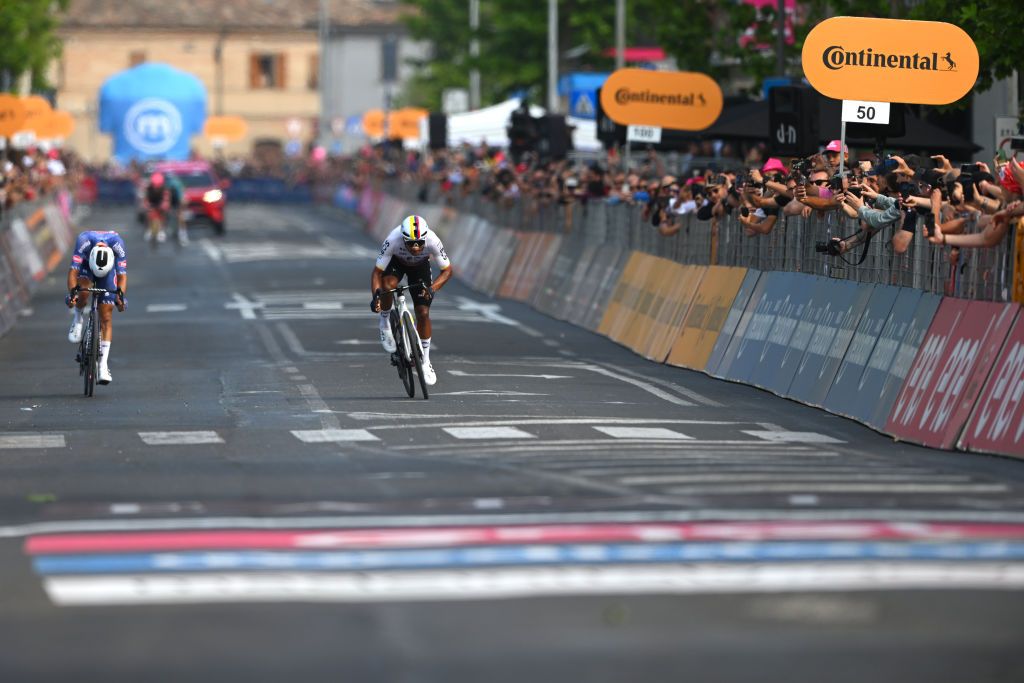 FANO ITALY MAY 16 LR Quinten Hermans of Belgium and Team Alpecin Deceuninck and Jhonatan Narvaez of Ecuador and Team INEOS Grenadiers sprint at finish line during the 107th Giro dItalia 2024 Stage 12 a 193km stage from Martinsicuro to Fano UCIWT on May 16 2024 in Fano Italy Photo by Dario BelingheriGetty Images