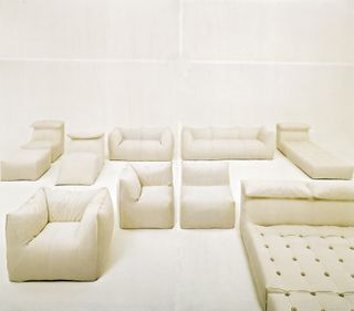White armchairs & sofas