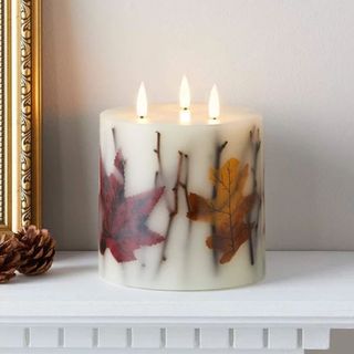 Remote candle with fall leaves and twigs design