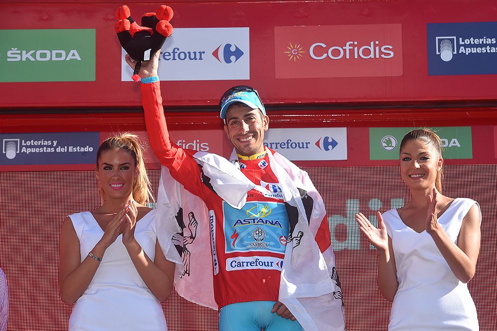 Fabio Aru celebrates on the stage 20 podium.