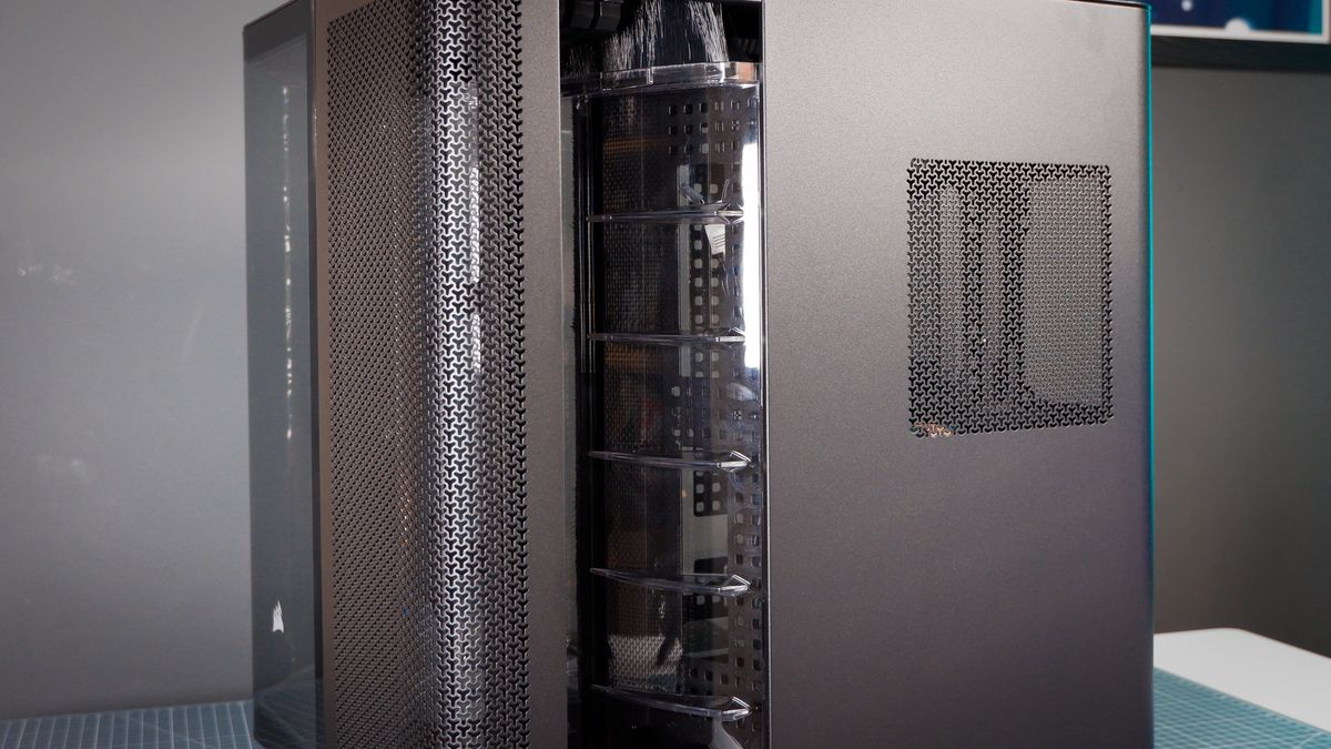 A Corsair Air 5400 PC case on a desk with various parts installed.