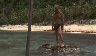 Cast Away Tom Hanks spearing a fish