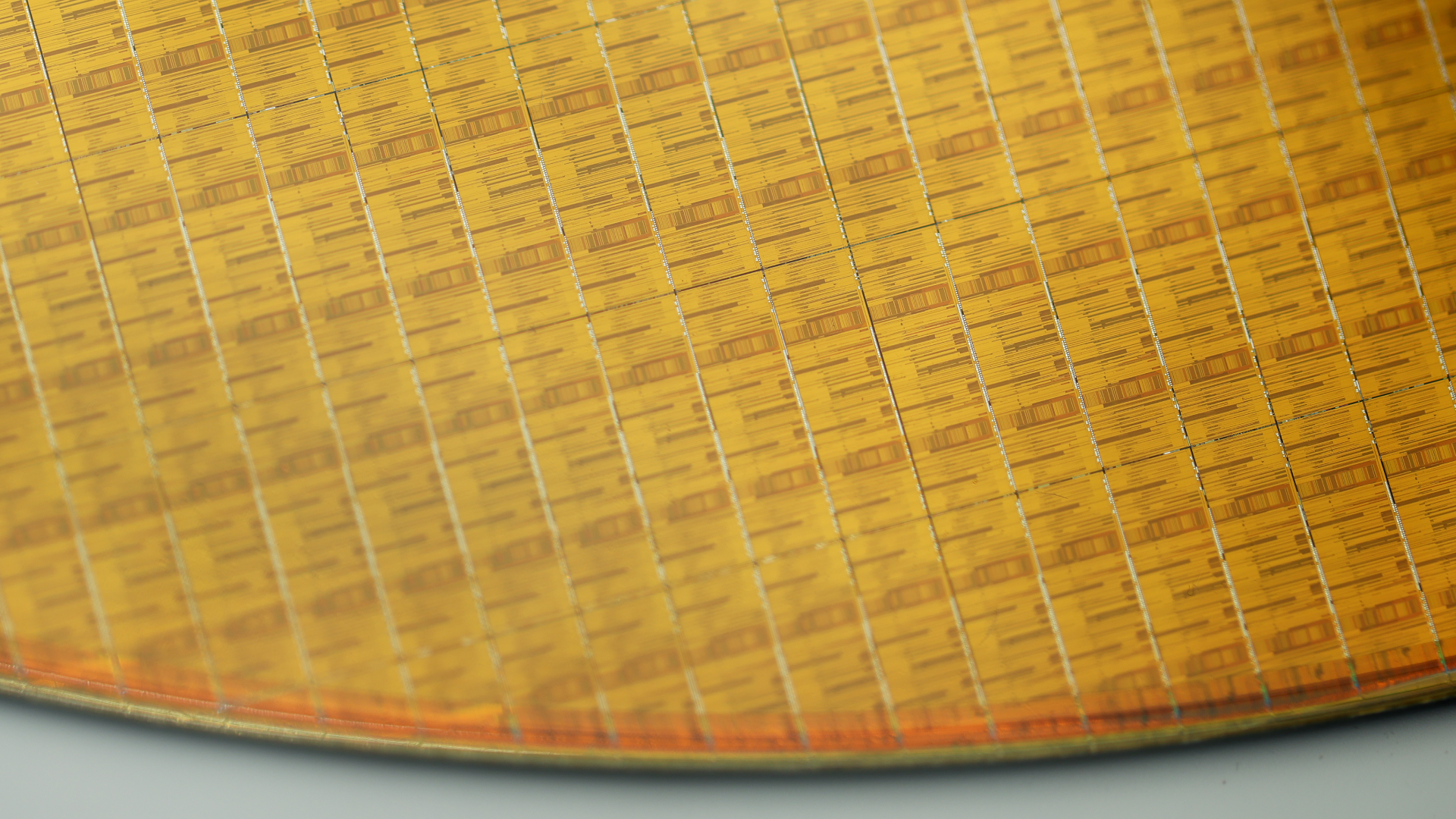 A silicon wafer with Micron Technology Inc.'s 1-gamma DRAM process node on display at the Micron Memory Japan K.K. booth at the Semicon Japan exhibition in Tokyo, Japan, on Thursday, Dec. 18, 2025. The exhibition is scheduled to continue through Dec. 19.