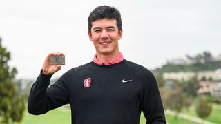 Michael Thorbjornsen with his PGA Tour card after graduating from PGA Tour University