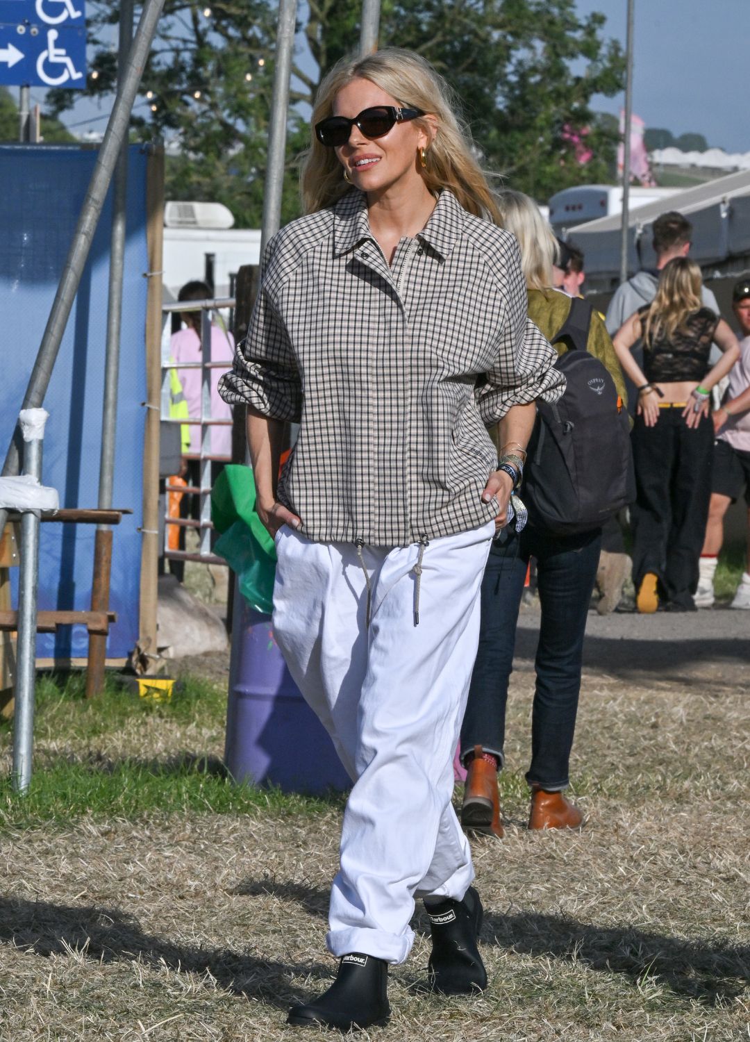 Sienna Miller is seen on day one of the Glastonbury Festival wearing Iconic British heritage brand Barbour on June 28, 2024 in Glastonbury, England.
