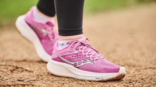 Woman wearing Saucony Ride 17 running shoes