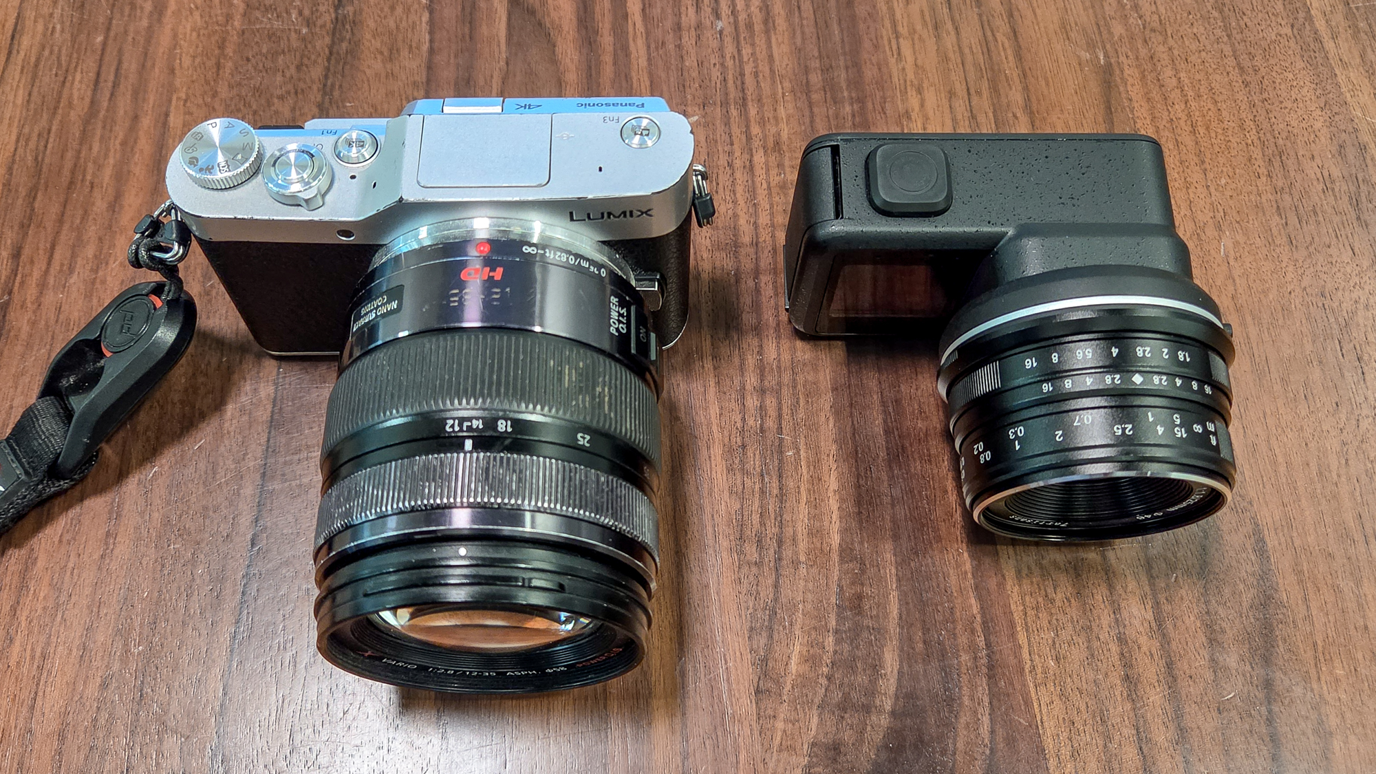 GoPro Mission 1 Pro ILS next to the Panasonic Lumix GX850