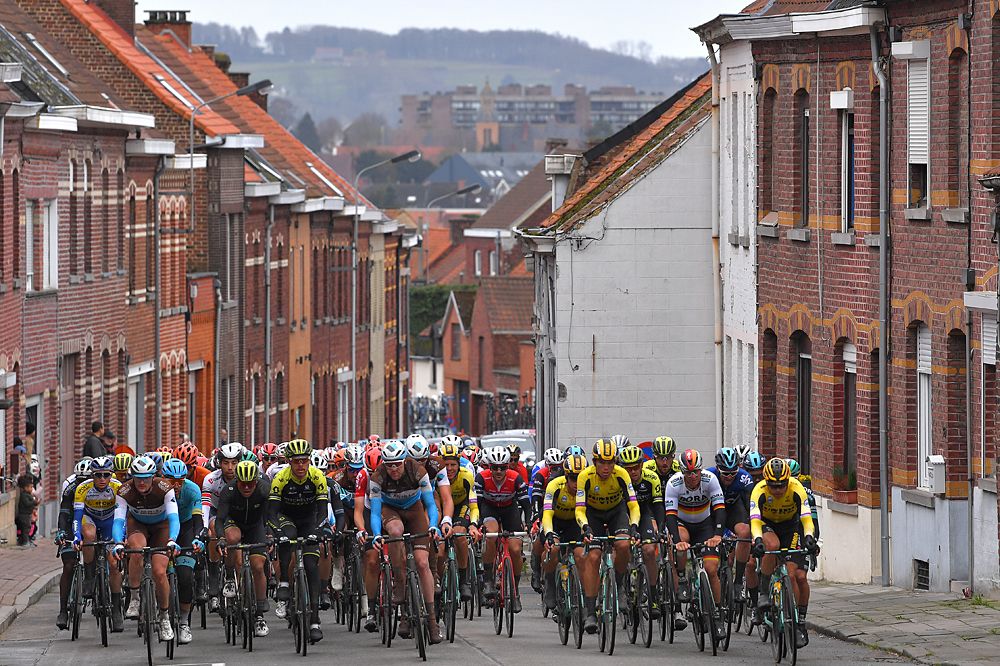 The peloton racing during Kuurne-Brussel-Kuurne