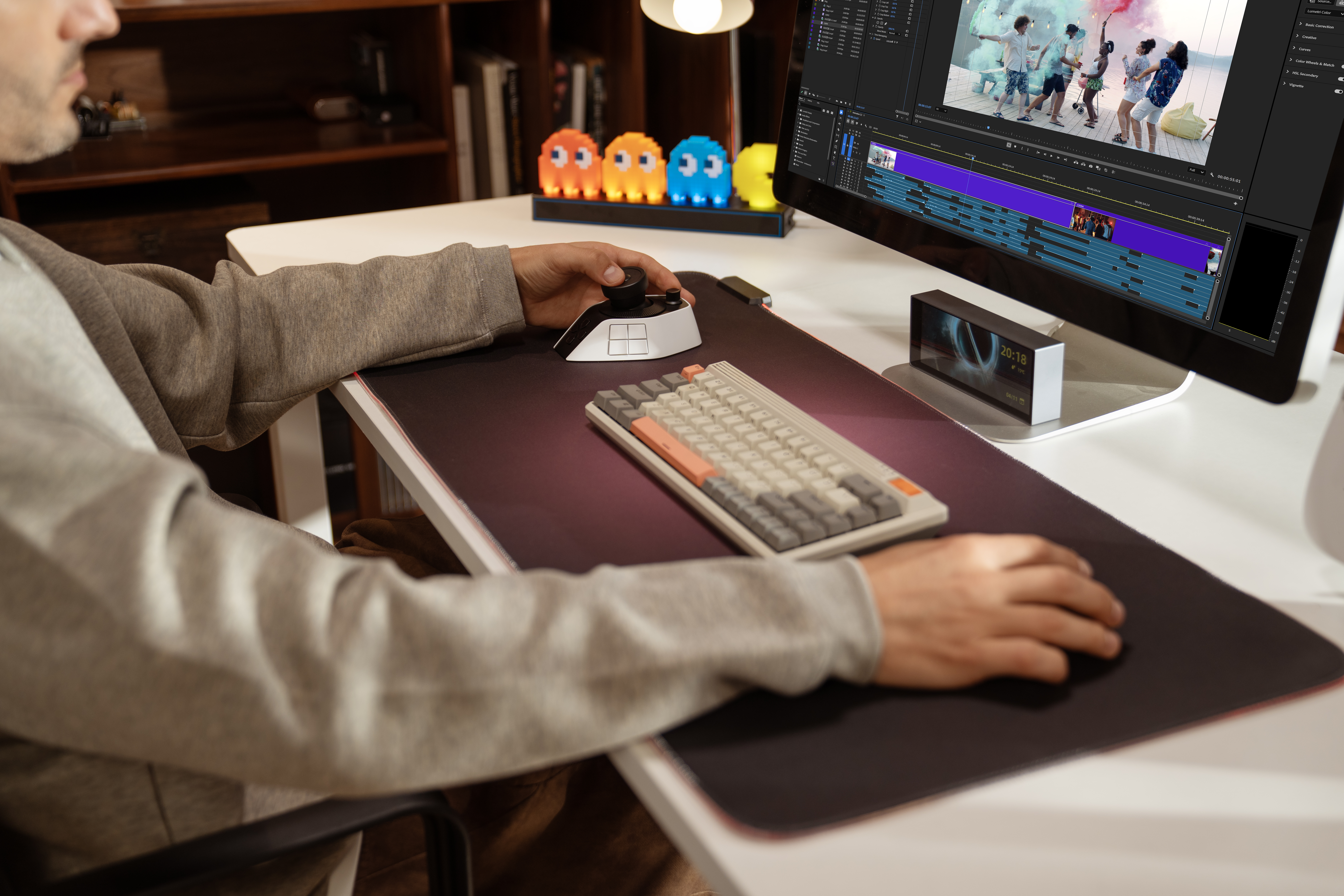 Man using XP-Pen Pilot Pro Editing Console to edit a video