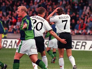 Iain Dowie (left) knows just how important home advantage can be for Northern Ireland.