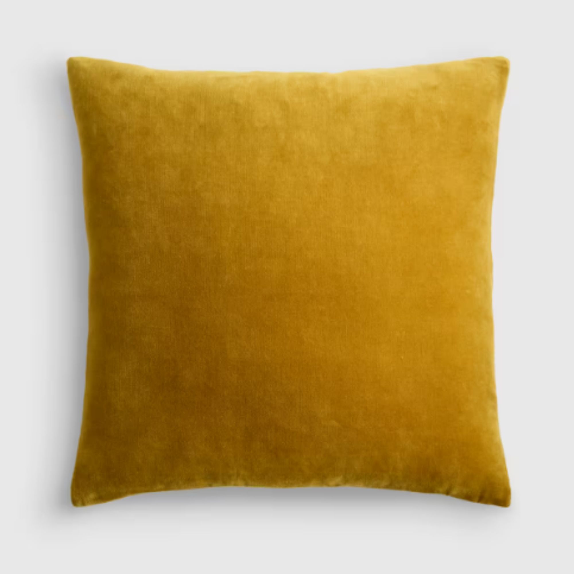 Mustard yellow velvet cushion