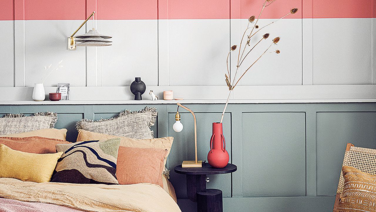 Pink and white bedroom with shelf ledge