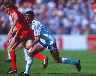 Jean Tigana of France in action against Belgium during the group stage of Euro 1984 in France