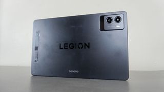 The Lenovo Legion Tab Gen 3 seen from the back on a table 