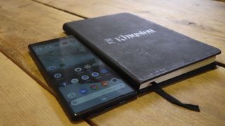 The Sony Xperia 10 Plus next to an A5 notebook. Image credit: TechRadar