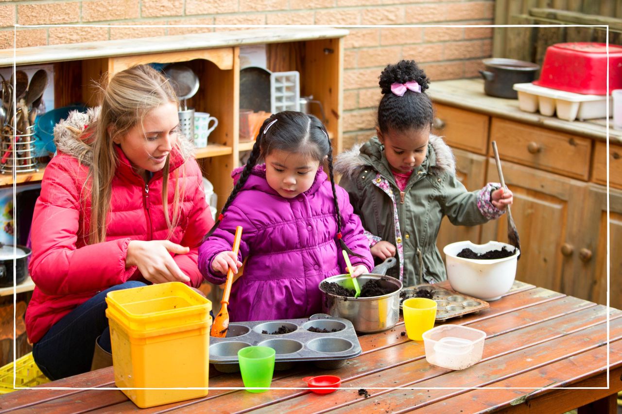 Two children making mud pies while an adult supervises