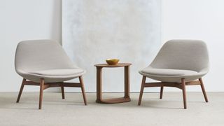 wooden minimalist chairs with light grey fabric
