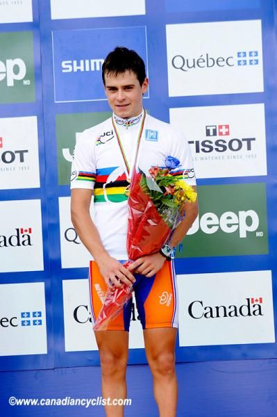 Junior men's cross country World Champion, Michiel Van Der Heijden (Netherlands) on the podium in his new rainbow-striped jersey
