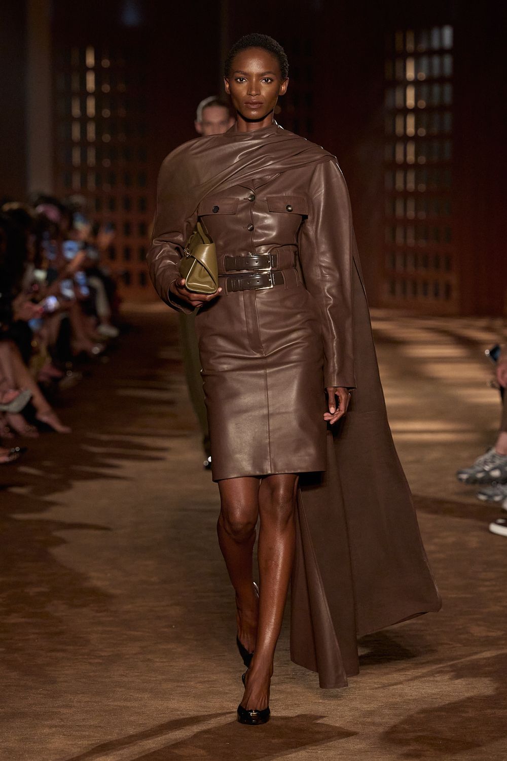 a model walks the ferragamo spring 2027 runway.
