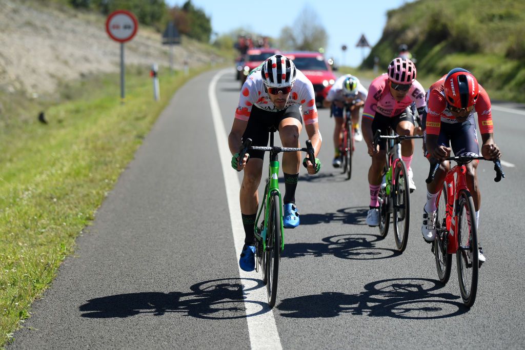 SANTURTZI SPAIN APRIL 06 LR Jon Barrenetxea Golzarri and Team Caja RuralSeguros RGA Polka dot Mountain Jersey and Natnael Tesfazion of Eritrea and Team Trek Segafredo compete in the breakaway during the 62nd Itzulia Basque Country Stage 4 a 1757km stage from Santurtzi to Santurtzi UCIWT on April 06 2023 in Santurtzi Spain Photo by David RamosGetty Images