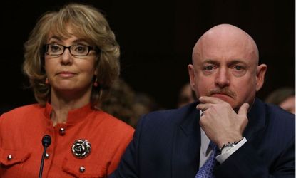 Shooting survivor and former congresswoman Gabrielle Giffords is seated next to her husband Mark Kelly during a Senate Judiciary Committee hearing on gun violence on Jan. 30.