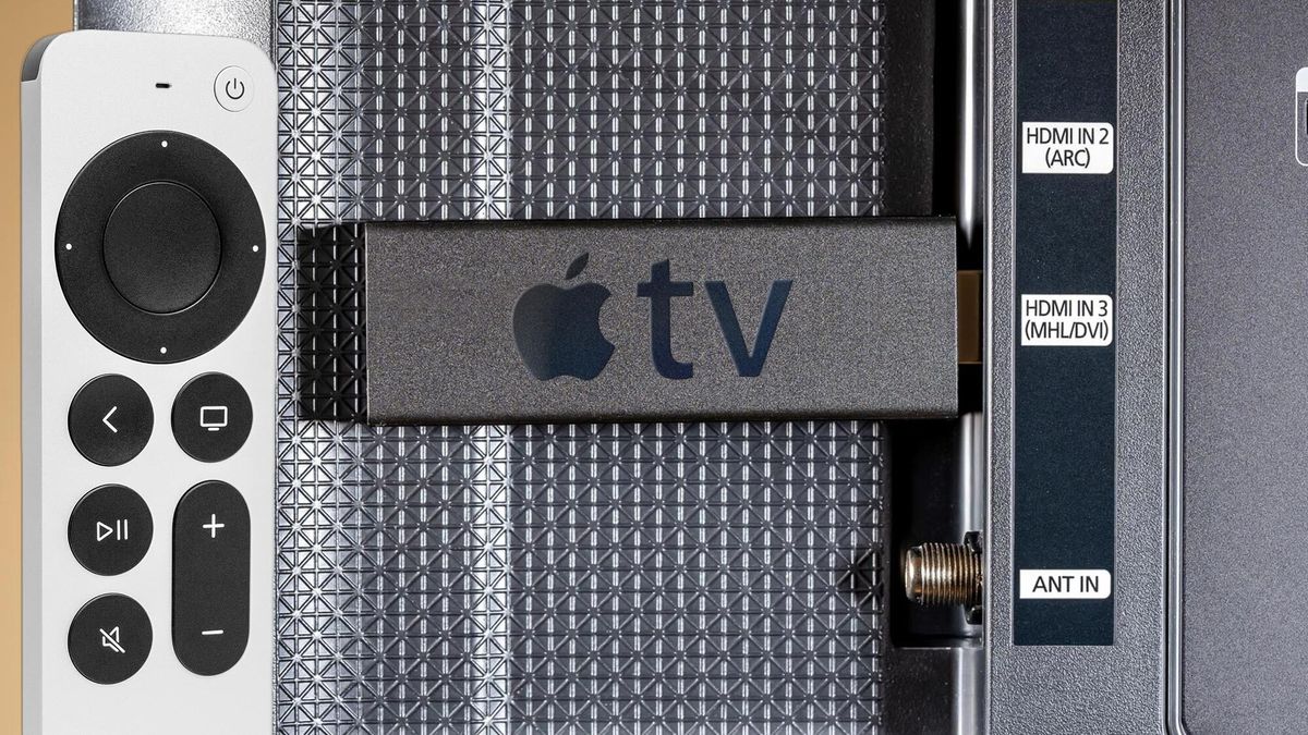 Concept art for an Apple TV stick plugged into a TV HDMI port, next to the new Apple Siri remote