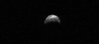 In April 2010, this radar image of the near-Earth asteroid 2005 YU55 was taken by the Arecibo radio telescope in Puerto Rico. On Nov. 8, 2011, this large space rock zips by Earth again and will be surveyed by radar, visual and infrared equipment.