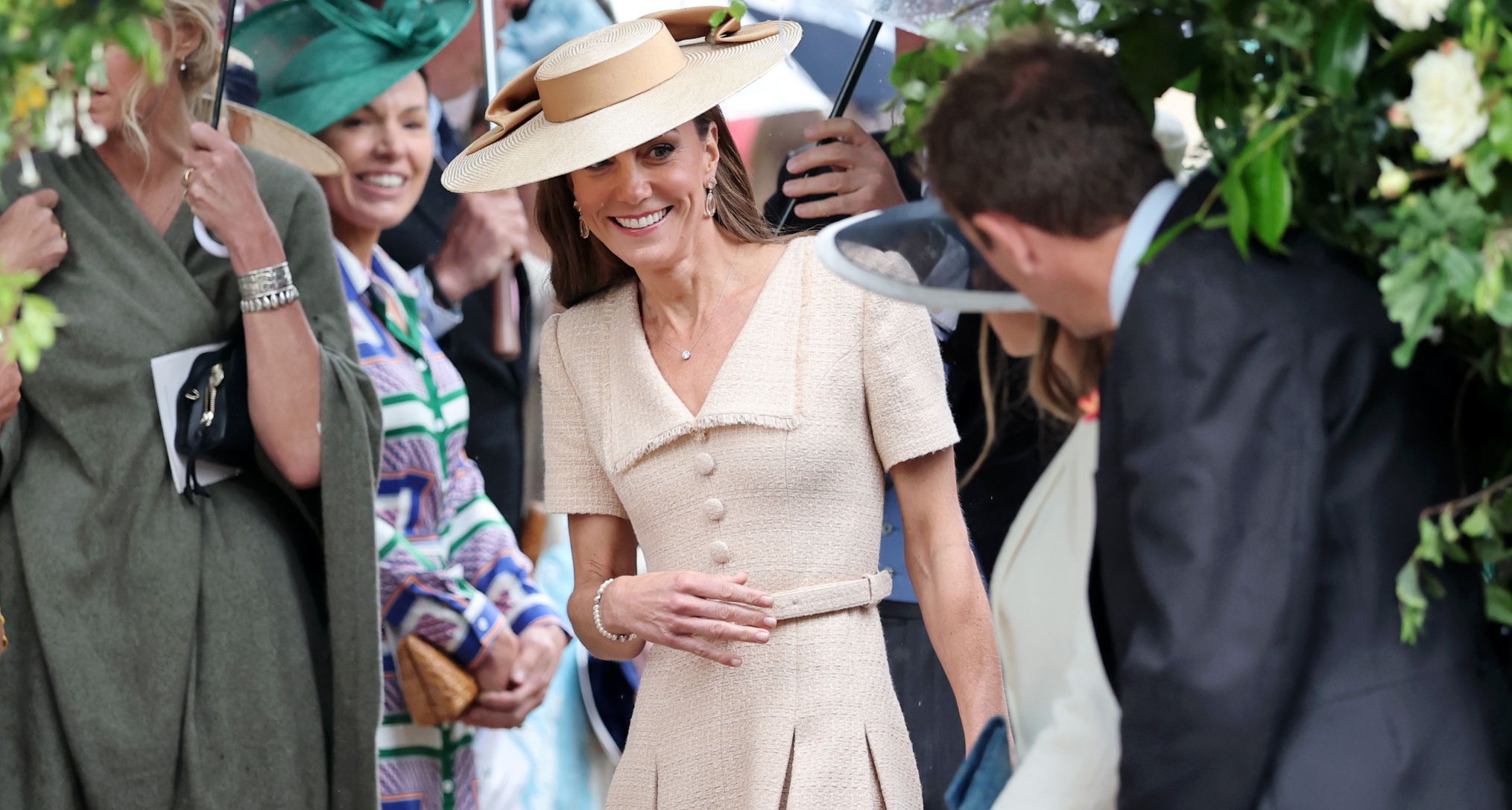 Princess Kate in a beige dress at Peter Phillips's wedding