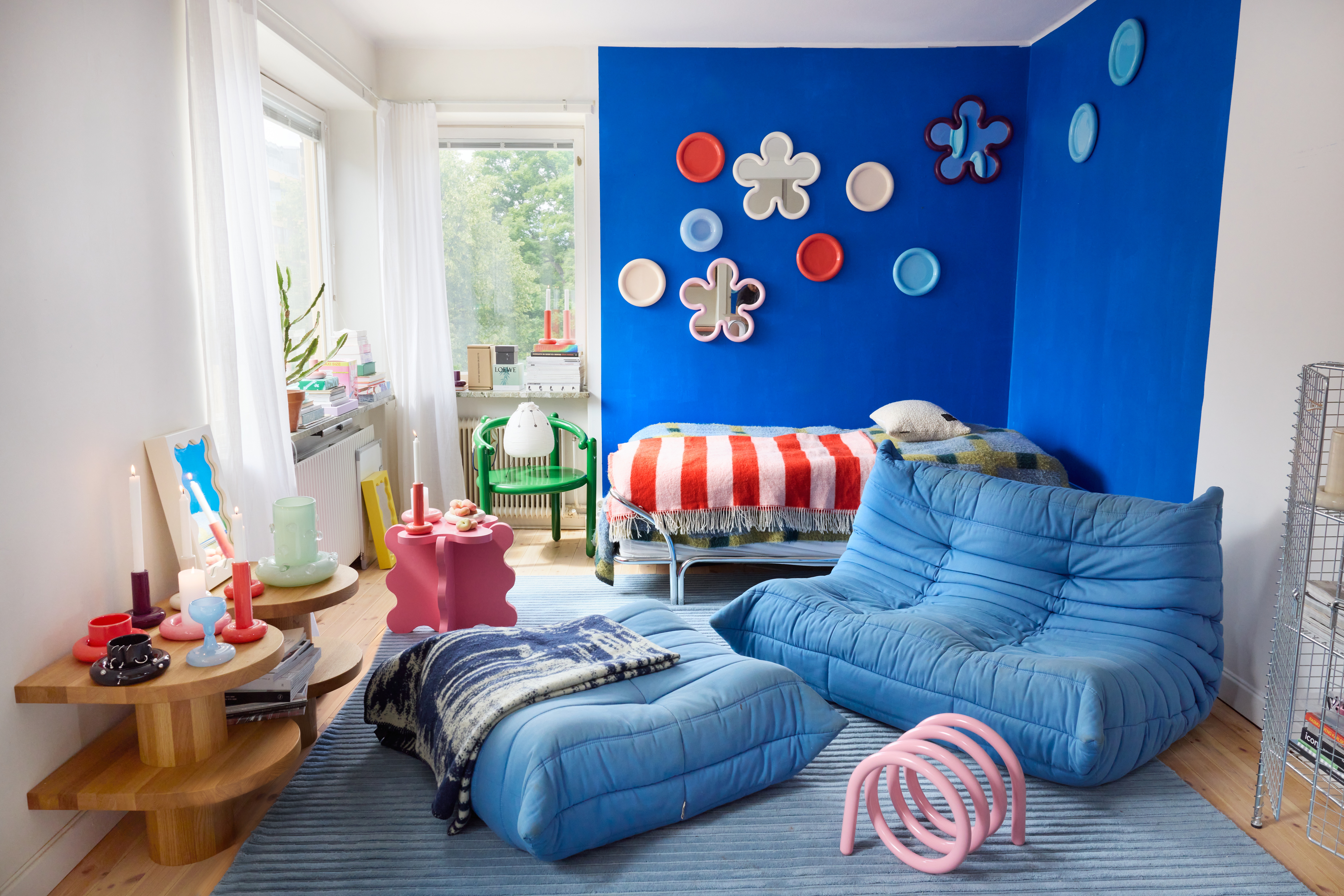 A series of whimsically shaped, pastel-shaded objects with a chunky feel sits in a Scandinavian studio flat with an irreverent atmosphere.