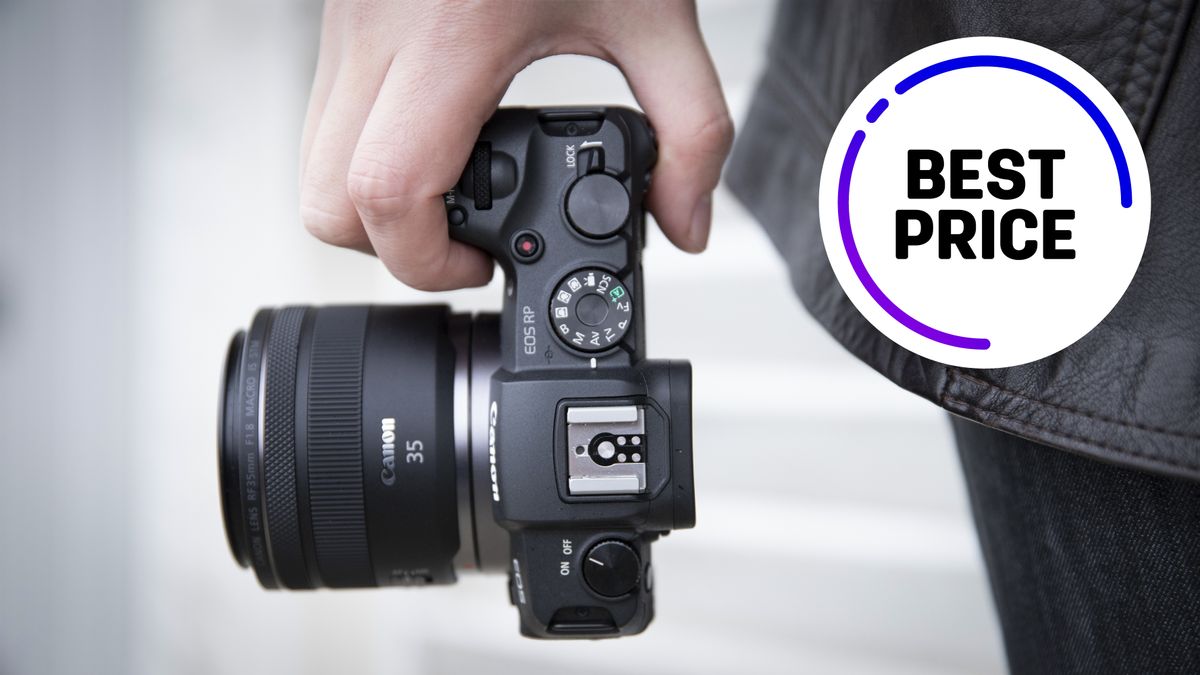 Canon EOS RP being held by a photographer, with the text &quot;Best price&quot;