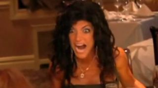 Teresa Giudice screams on The Real Housewives of New Jersey, just before her iconic Season 1 table flip.