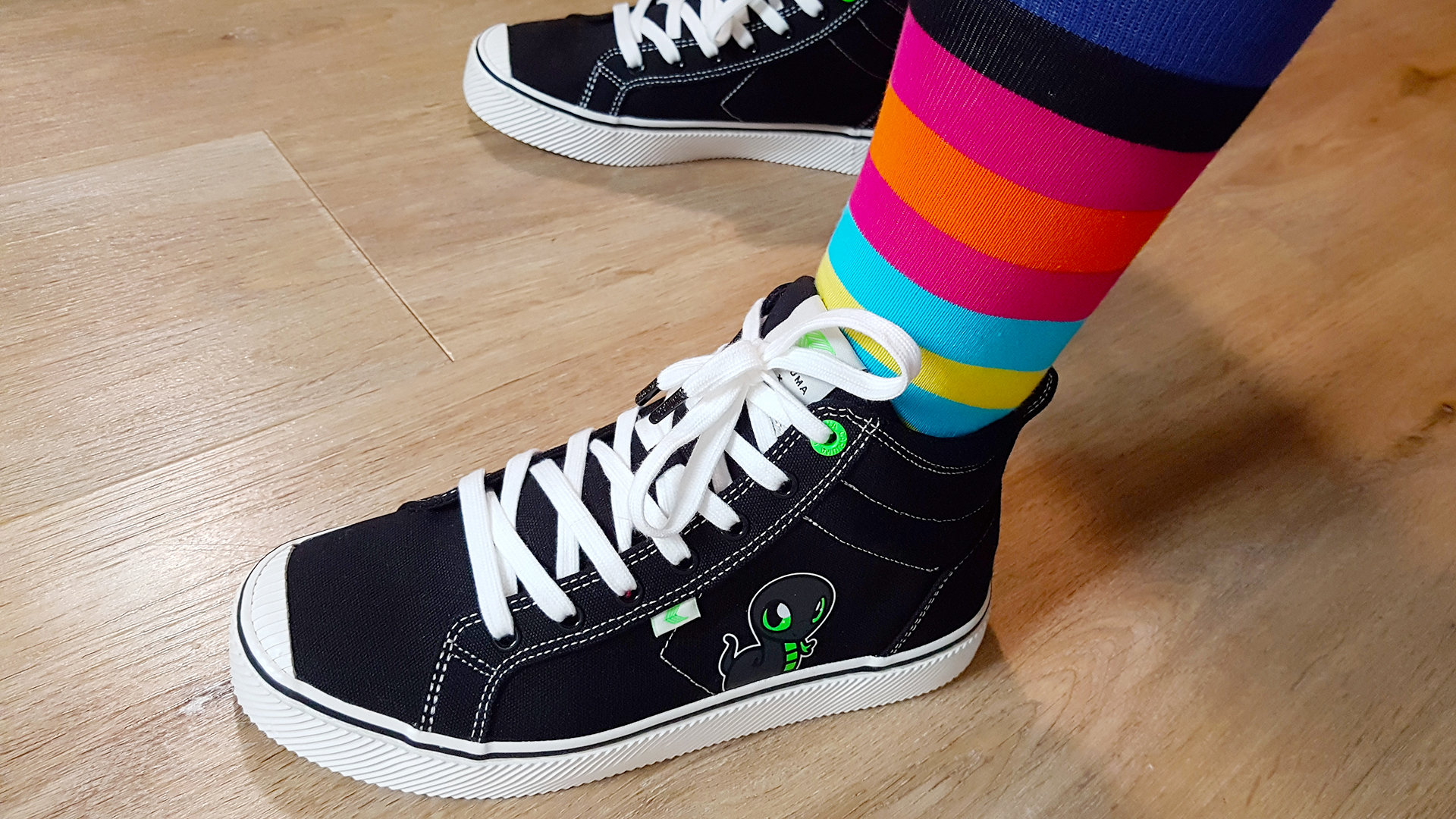 Katie wears Razer's Sneki Snek sneakers.