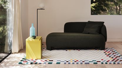 a modern colorful checkerboard rug in a room