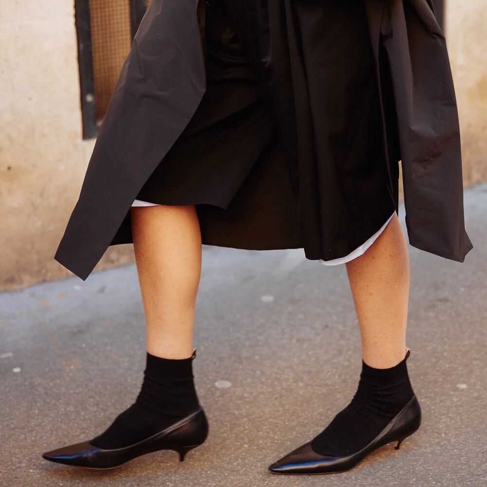 Pointed-toe kitten-heel pumps.