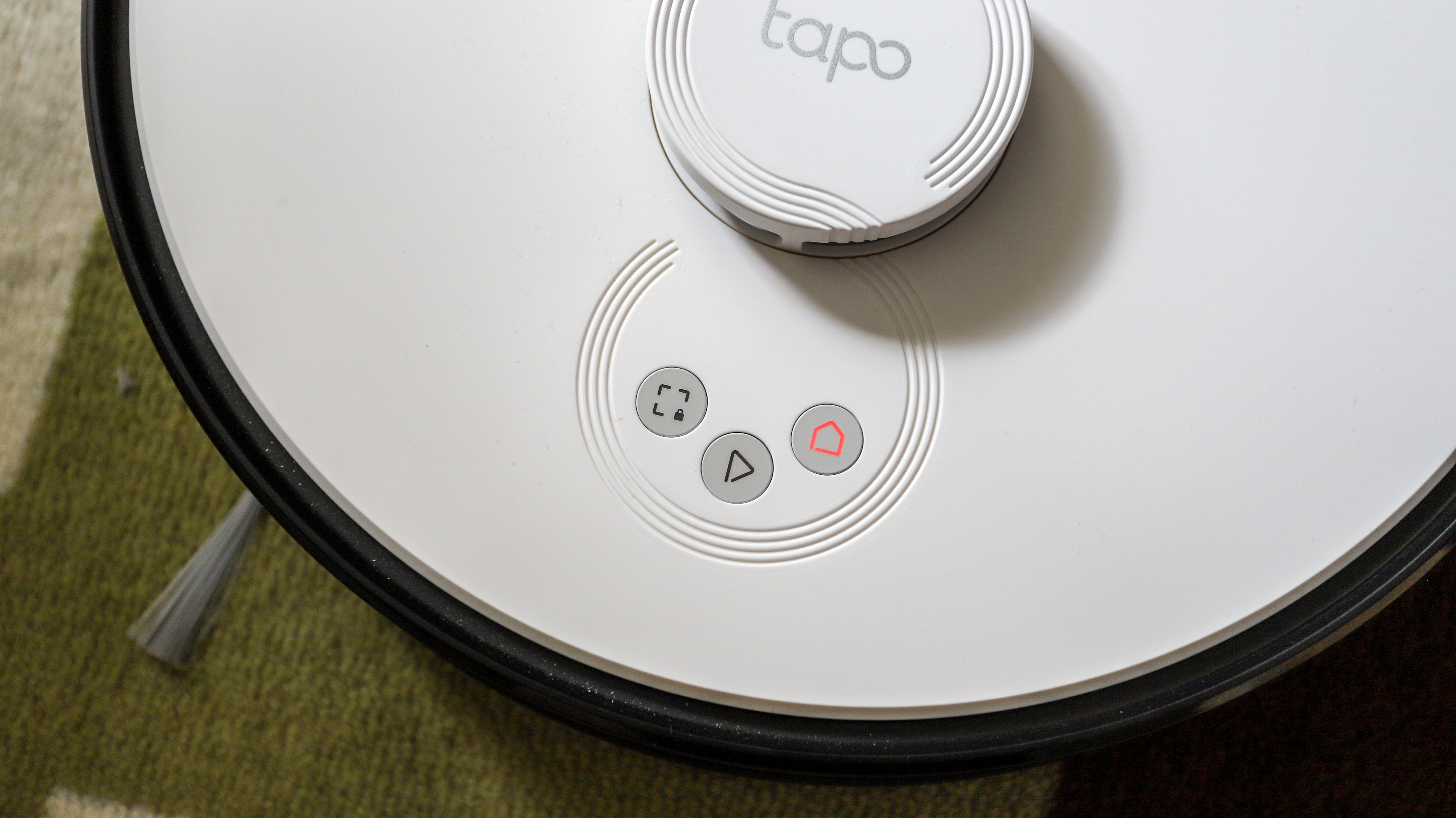 Three buttons on the top of TP-Link Tapo RV30 Plus