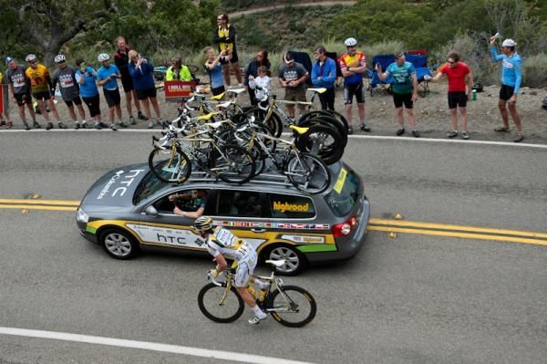Austria's Bernhard Eisel rides back near his Team HTC-Columbia team car.