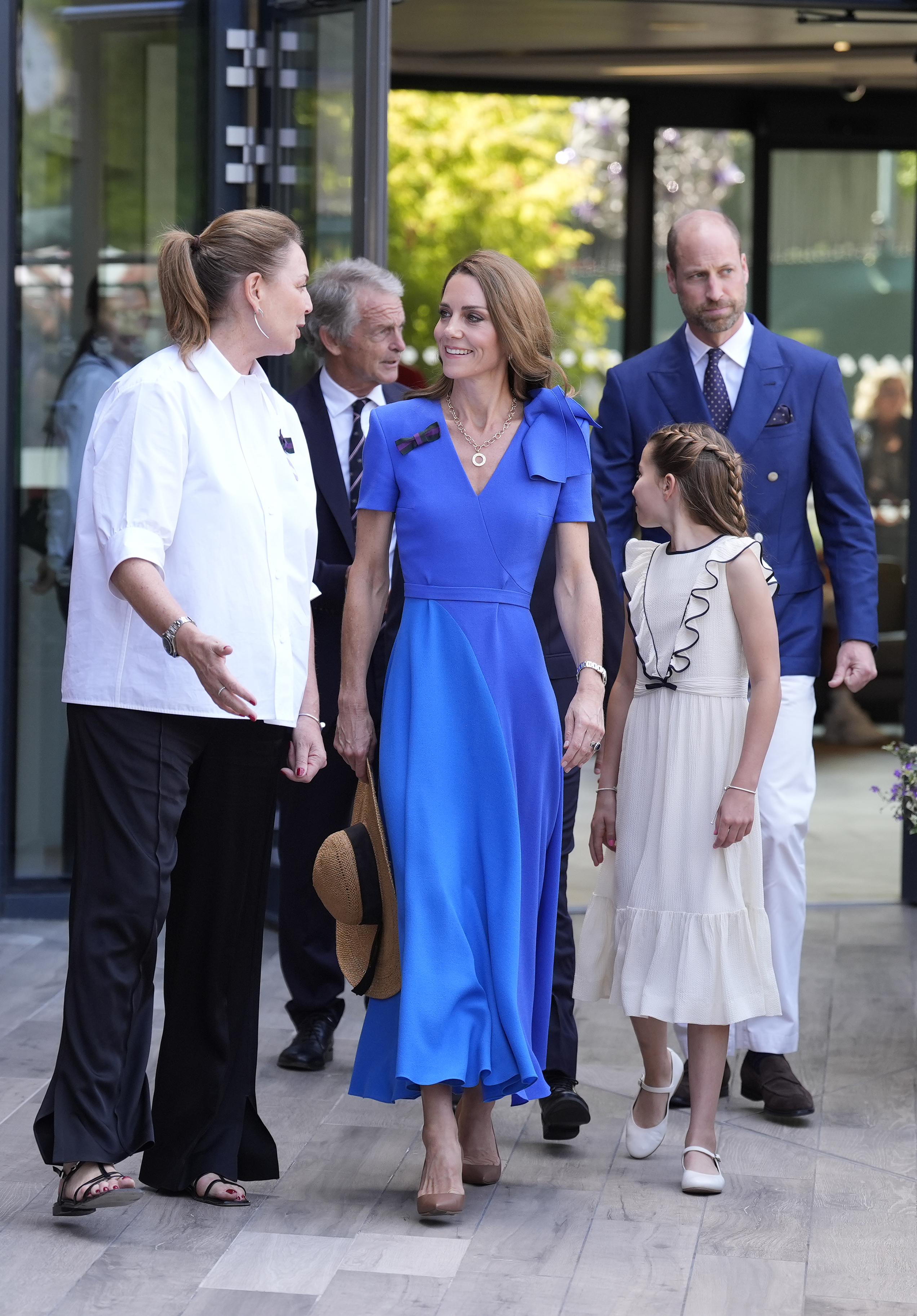 Prince William wearing crisp white Wimbledon pants