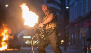 The Rock with giant gun in Fast and Furious