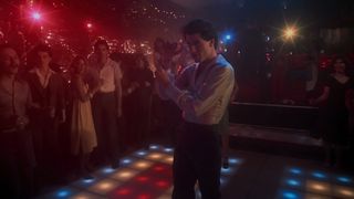 John Travolta boogies on the dance floor in Saturday Night Fever