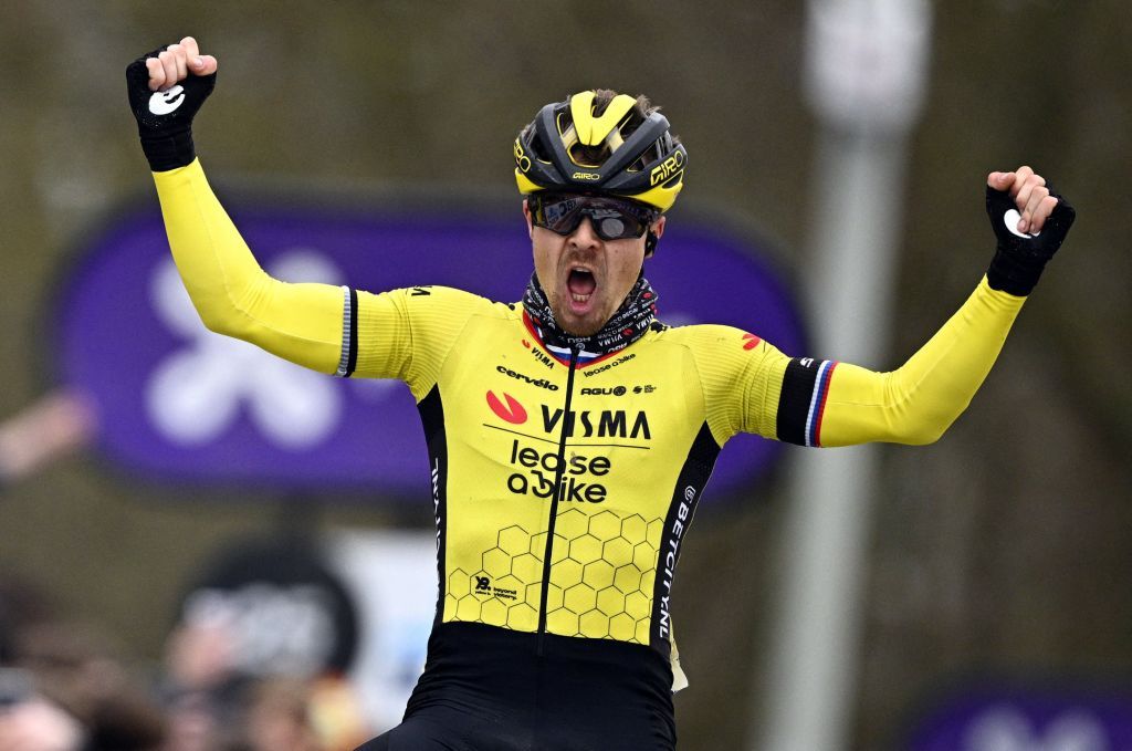 Slovenian Jan Tratnik of Team Visma-Lease a Bike celebrates after winning the 79th edition of the men's one-day cycling race Omloop Het Nieuwsblad (UCI World Tour), 202km from Gent to Ninove, Saturday 24 February 2024. BELGA PHOTO JASPER JACOBS (Photo by JASPER JACOBS / BELGA MAG / Belga via AFP)