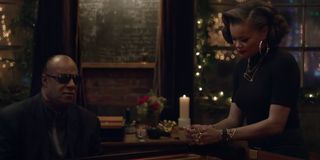 Stevie Wonder and Andra Day in the "Someday At Christmas" music video
