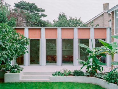 Triangle House by Artefact showing colour interiors and a graphic architectural approach that blends rawness and colour