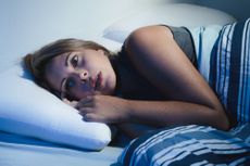 insomnia, woman in bed, can't sleep