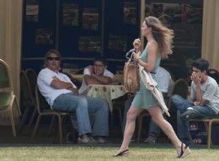 Kate Middleton (Wearing A Green Dress) In The Crowd At The Chakravarty Cup Polo Match At Beaufort Polo Club Near Tetbury Gloucestershire Where Her Boyfriend William Is Playing In The Charity Match
