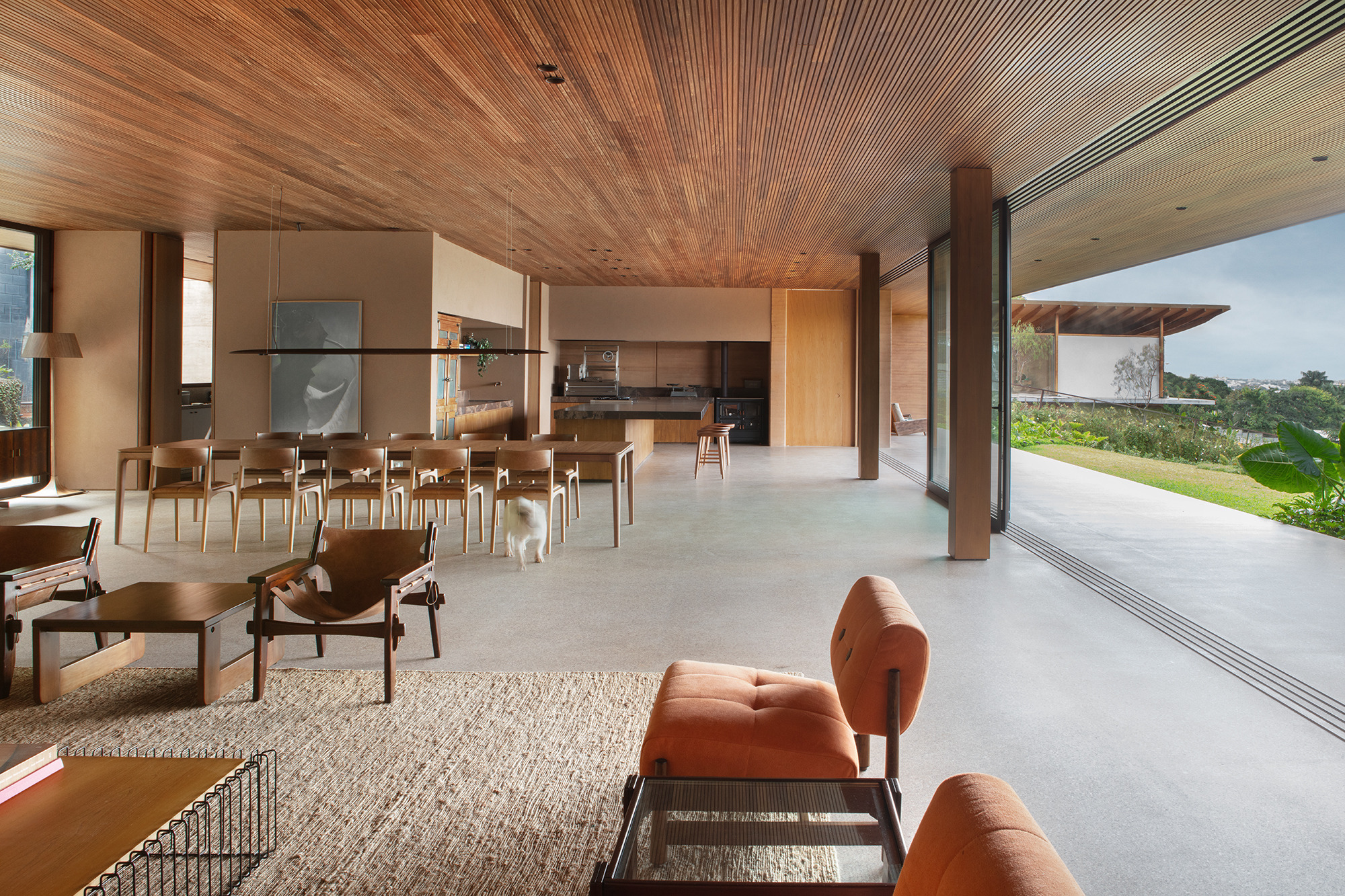 Looking back to the entrance past the living area and kitchen