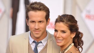 Actor Ryan Reynolds and actress Sandra Bullock arrive at the Los Angeles premiere of &quot;The Proposal&quot; at the El Capitan Theatre on June 1, 2009 in Hollywood, California.