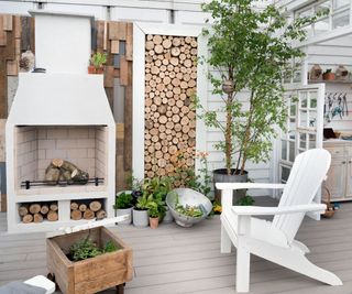 outdoor fireplace with log store