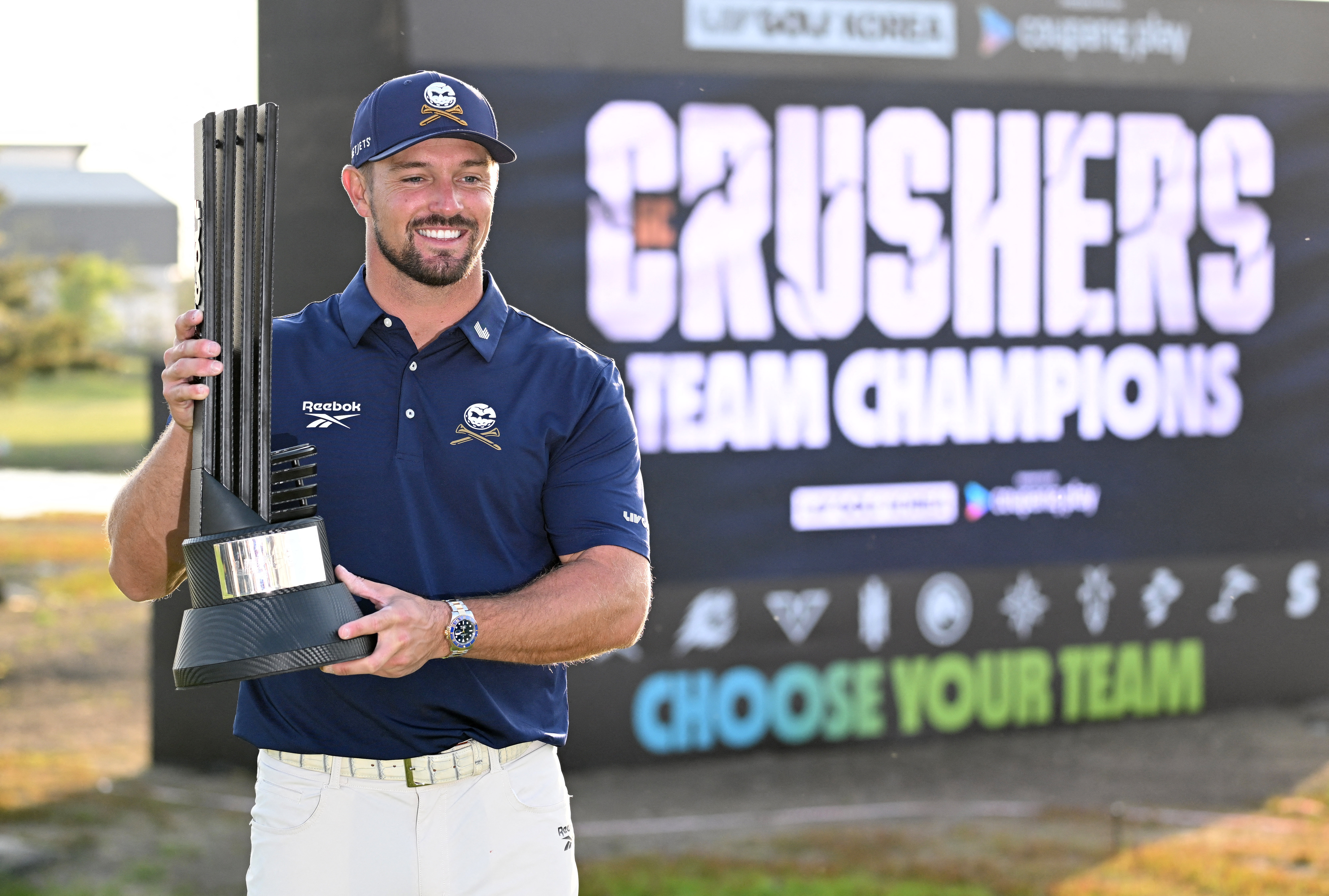 Bryson DeChambeau holds the LIV Golf Korea trophy